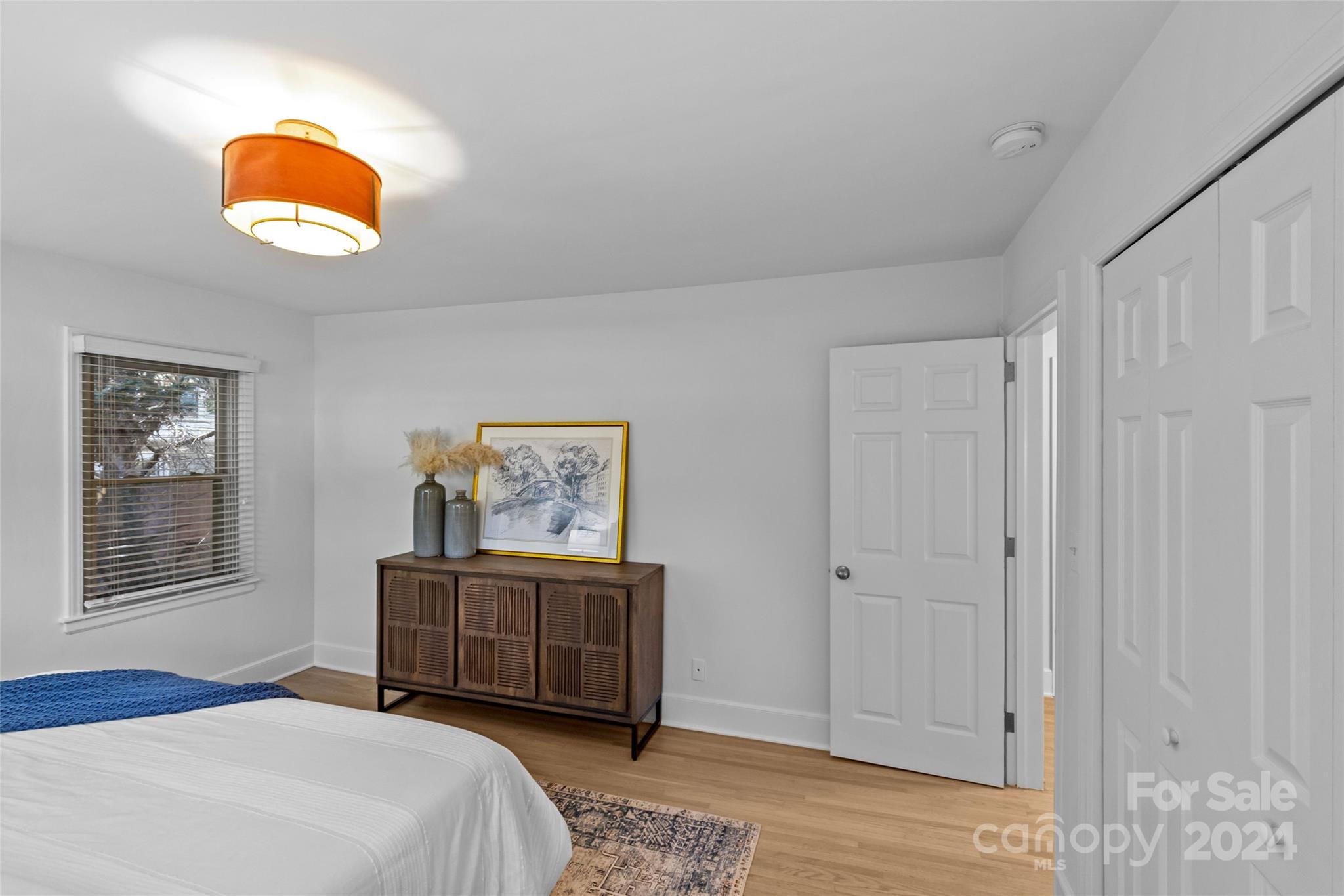 1639 Merry Oaks Road Charlotte, NC 28205 - Photo 31 of 47 a bedroom with a bed and a window