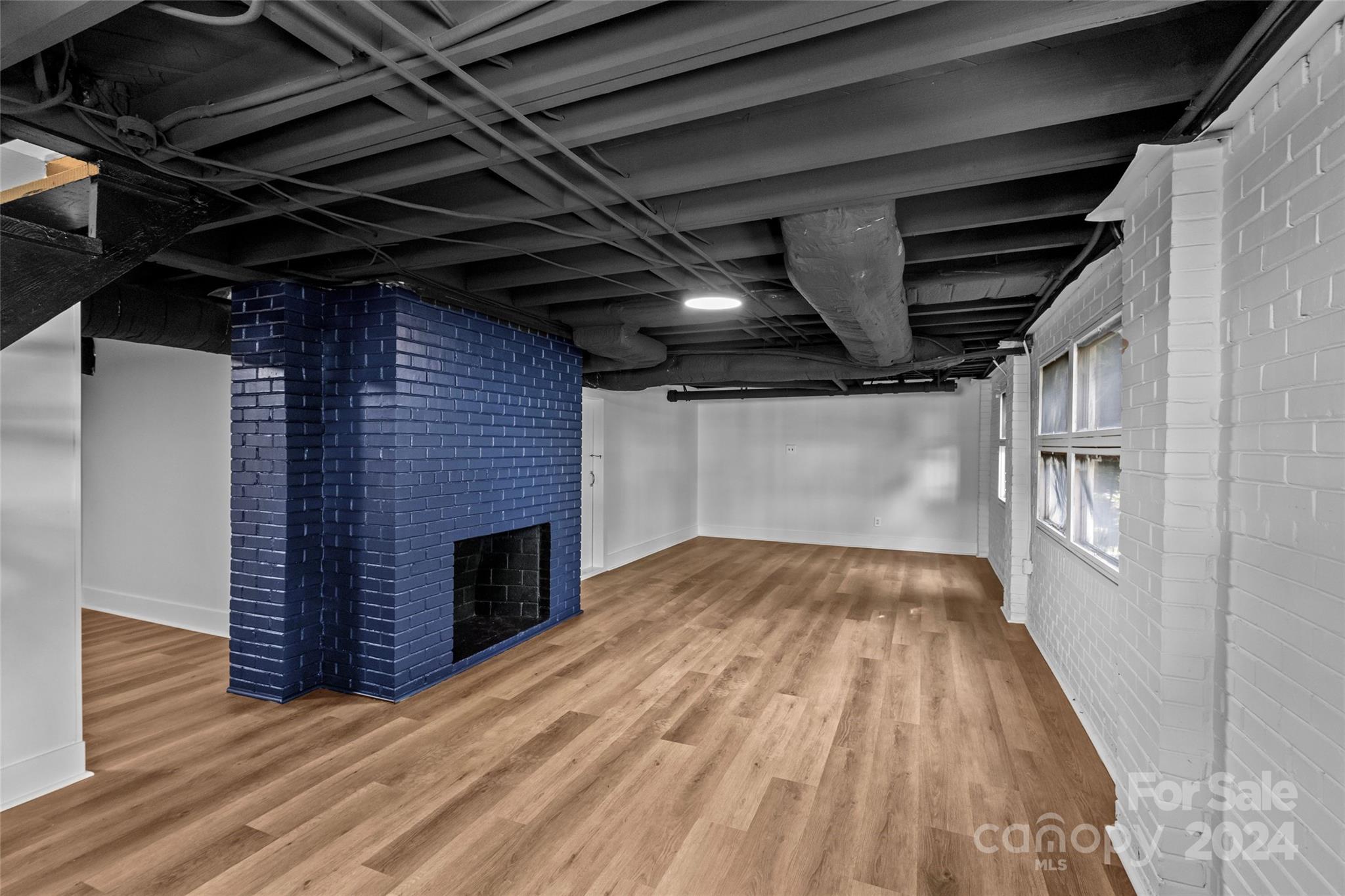 1639 Merry Oaks Road Charlotte, NC 28205 - Photo 34 of 47 a view of empty room with wooden floor