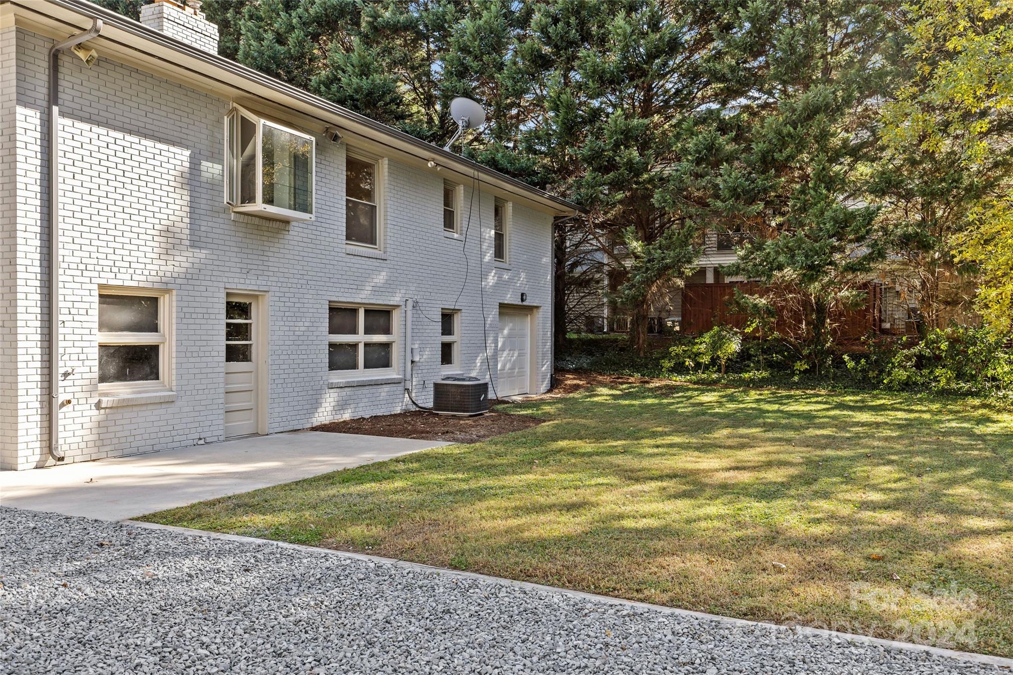 1639 Merry Oaks Road Charlotte, NC 28205 - Photo 39 of 47 a view of a house with a yard