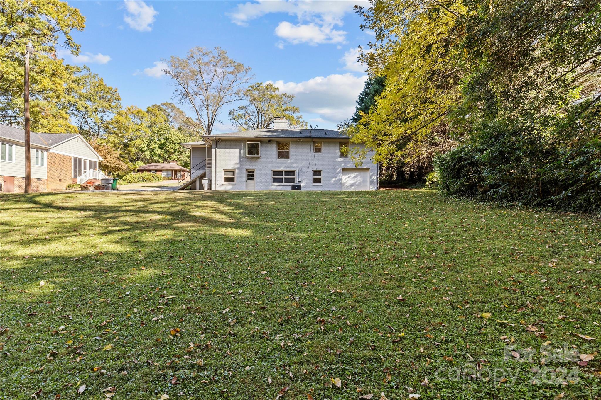 1639 Merry Oaks Road Charlotte, NC 28205 - Photo 45 of 47 a view of a house with a big yard