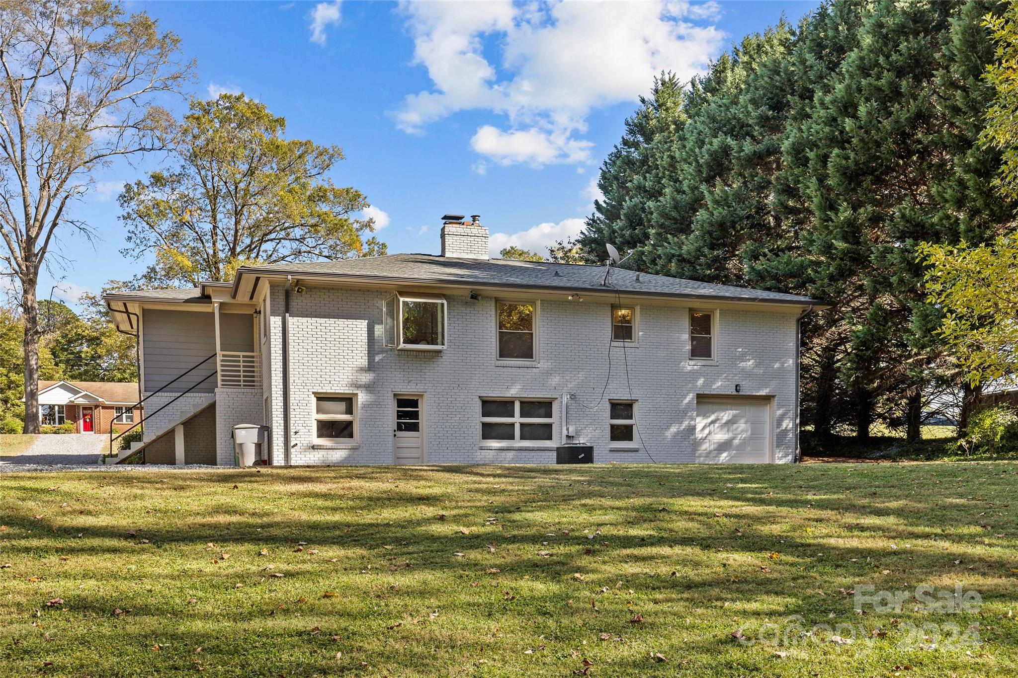 1639 Merry Oaks Road Charlotte, NC 28205 - Photo 46 of 47 a view of a house with a swimming pool