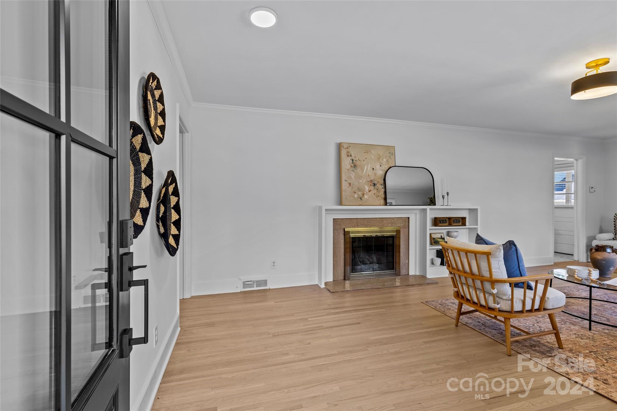 1639 Merry Oaks Road Charlotte, NC 28205 - Photo 5 of 47 a view of a livingroom with furniture and a fireplace