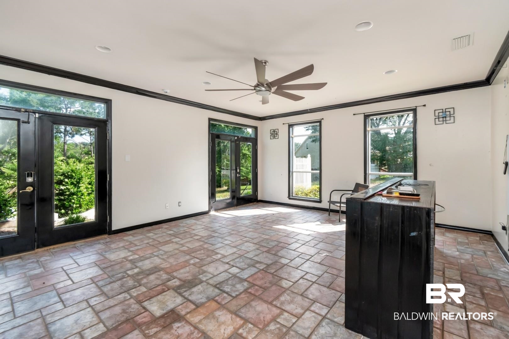 2640 Meadowlake Road Semmes, AL 36575 - Photo 41 of 55 Unfurnished living room with french doors, a ceiling fan, and ornamental molding