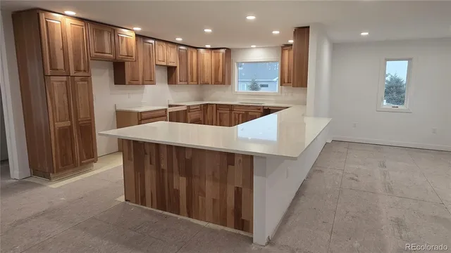 a bathroom with a shower and toilet