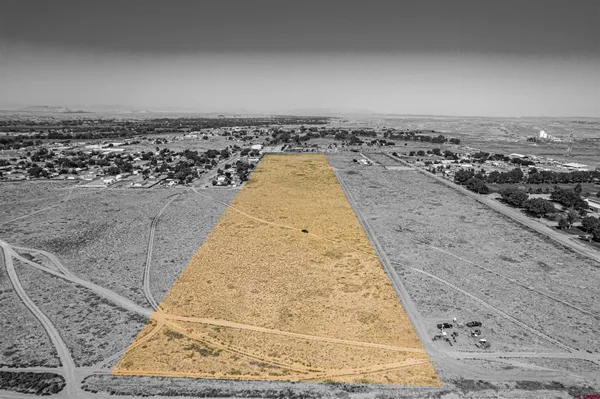 a view of an ocean beach and city