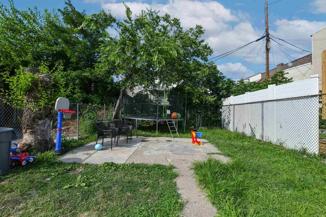 a childrens park with lots of swings and slides