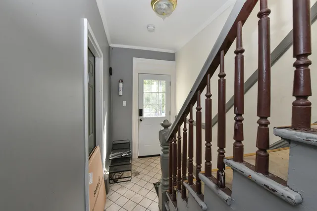 a view of an entryway with staircase