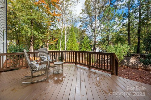 a view of a two chairs in the deck