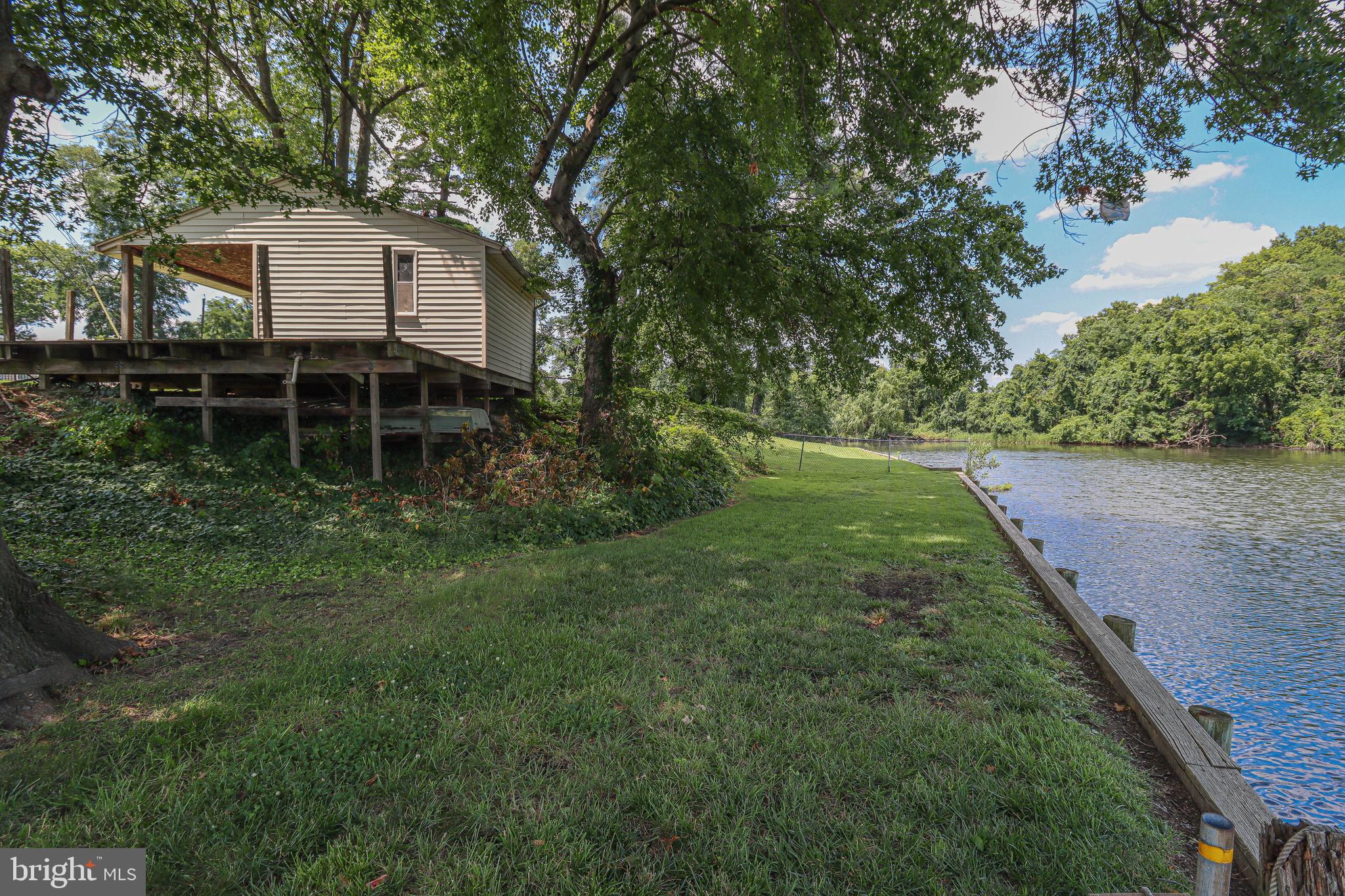 3147 Baybriar Road Dundalk, MD 21222 - Photo 48 of 65 Waterfront with elevated deck.