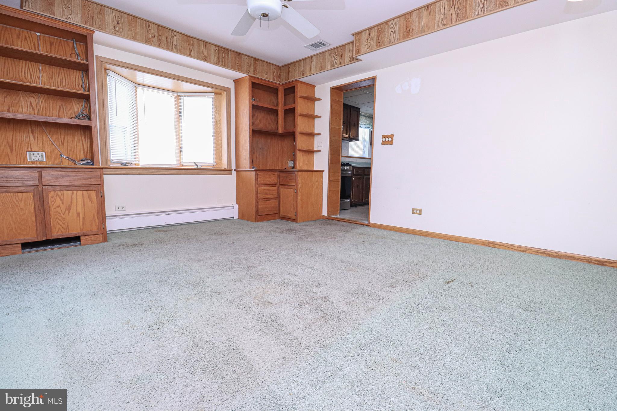 3147 Baybriar Road Dundalk, MD 21222 - Photo 6 of 65 Living room off kitchen with bow window.