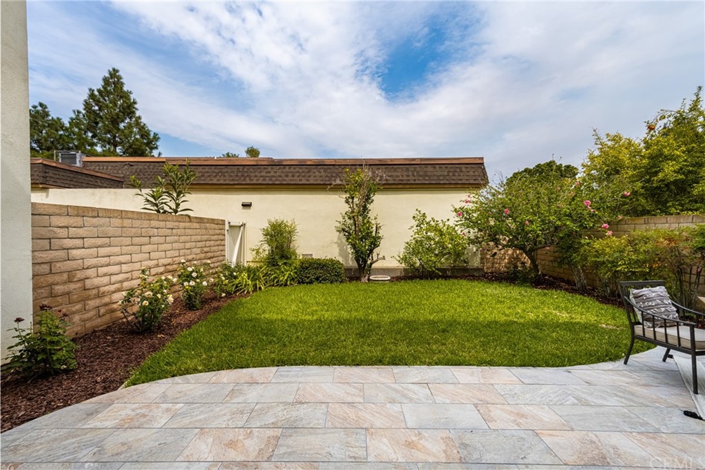 4091 Germainder Way Irvine, CA 92612 - Photo 12 of 47 a view of a yard with an outdoor seating