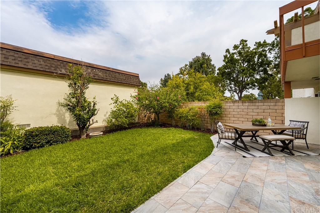 4091 Germainder Way Irvine, CA 92612 - Photo 13 of 47 a view of backyard with outdoor seating