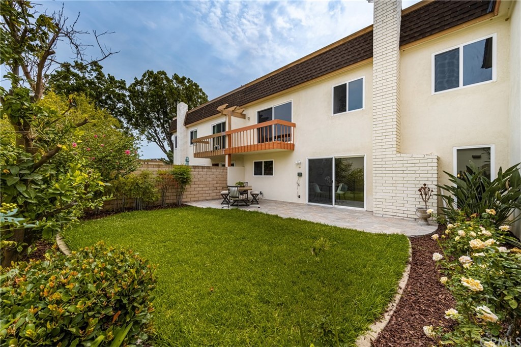 4091 Germainder Way Irvine, CA 92612 - Photo 14 of 47 a view of a house with a yard