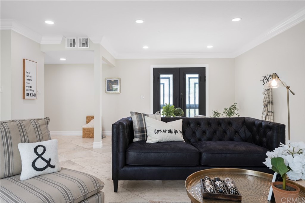 4091 Germainder Way Irvine, CA 92612 - Photo 16 of 47 a living room with furniture and a couch