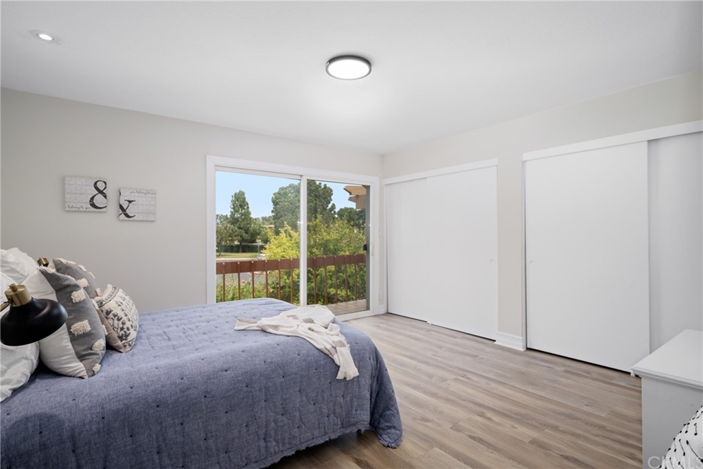 4091 Germainder Way Irvine, CA 92612 - Photo 20 of 47 a bedroom with a bed and a large window