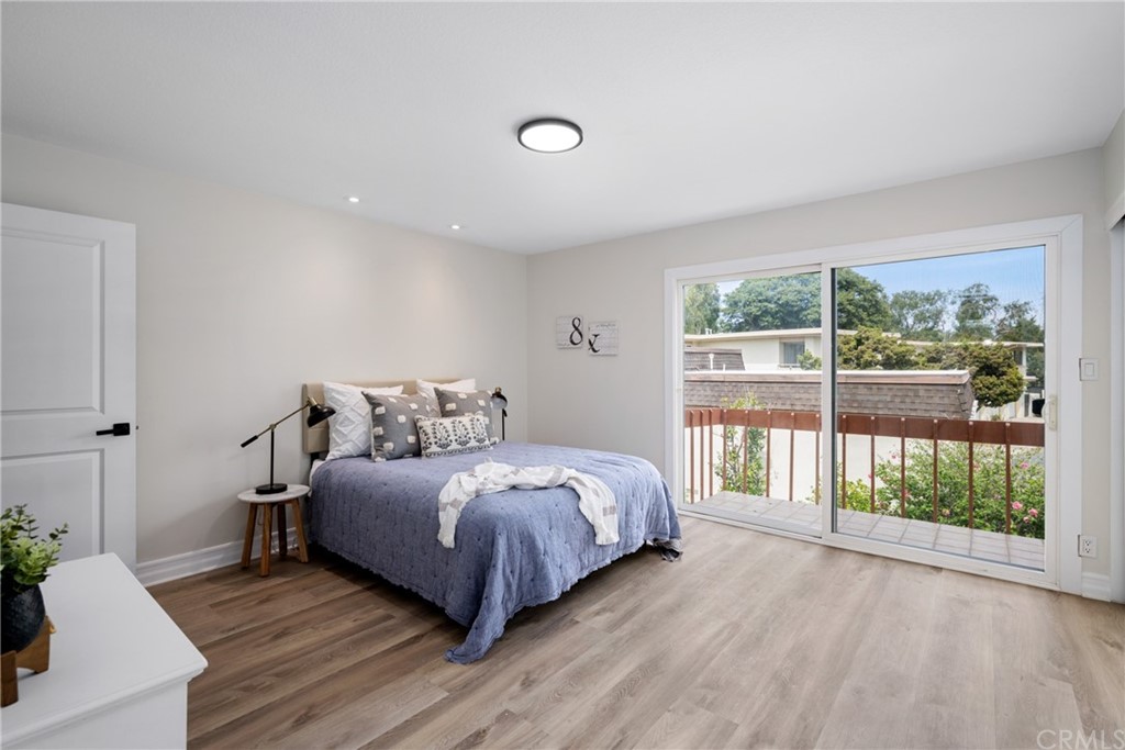 4091 Germainder Way Irvine, CA 92612 - Photo 21 of 47 a bedroom with a bed and a large window