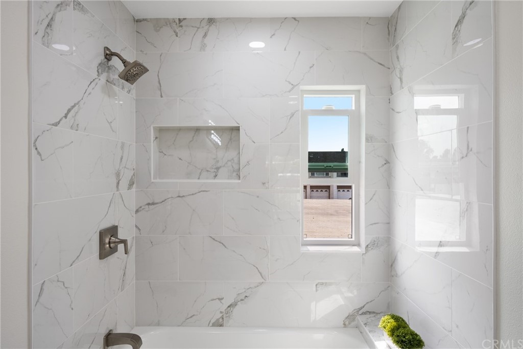 4091 Germainder Way Irvine, CA 92612 - Photo 26 of 47 a bathroom with a bathtub