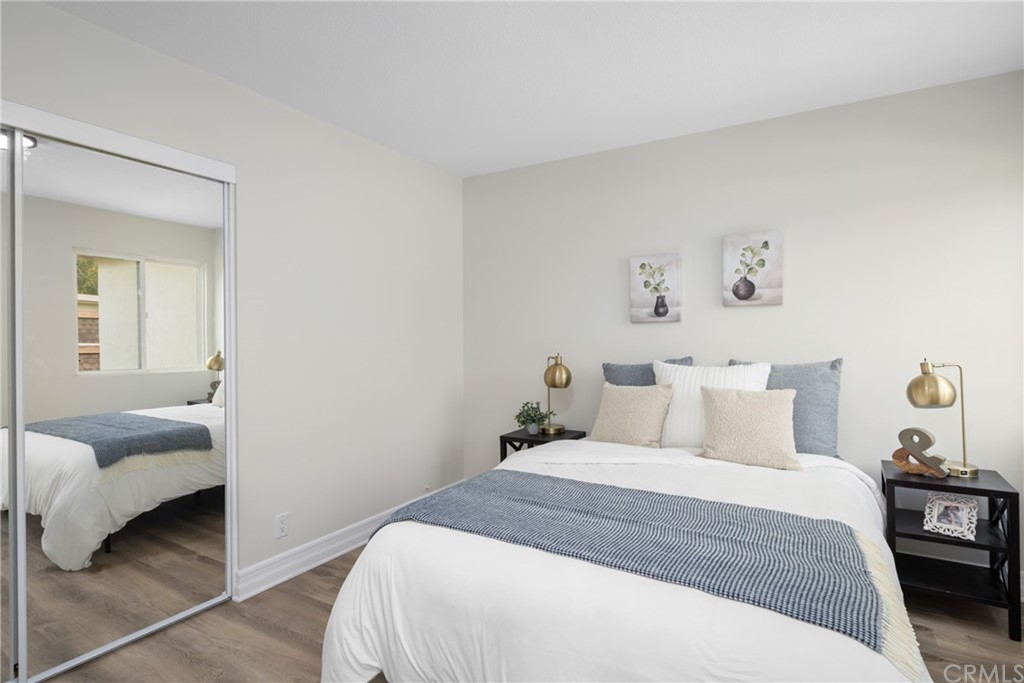 4091 Germainder Way Irvine, CA 92612 - Photo 31 of 47 a bedroom with a bed and a view of bedroom