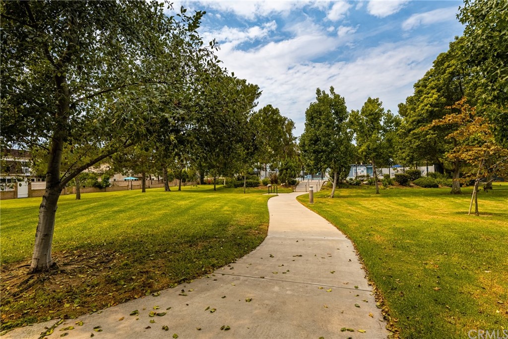 4091 Germainder Way Irvine, CA 92612 - Photo 40 of 47 a view of a swimming pool with an outdoor space