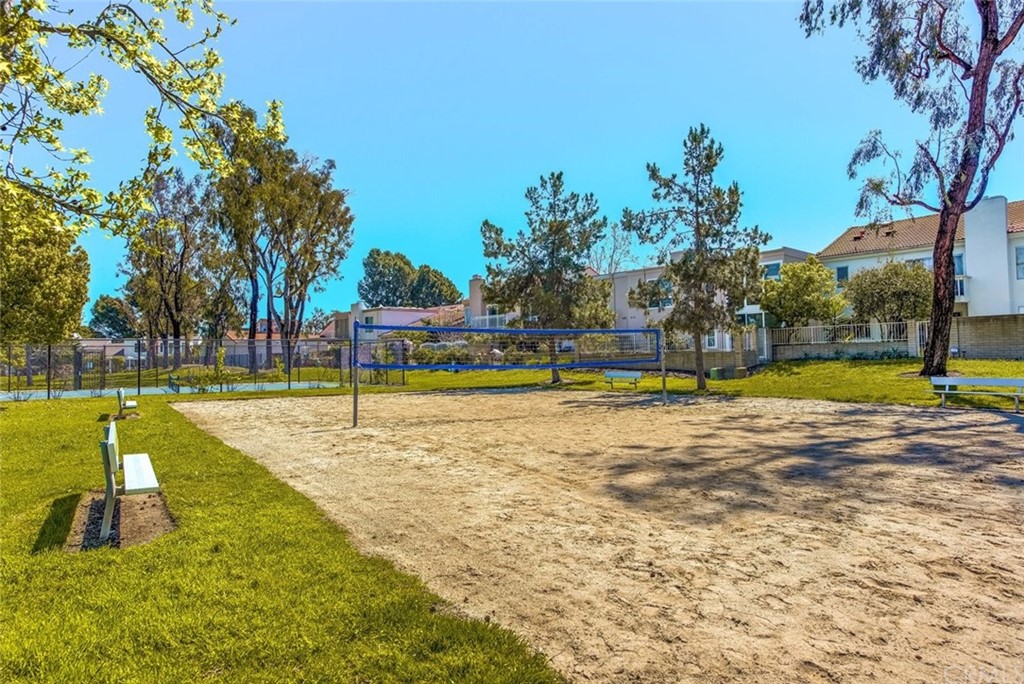 4091 Germainder Way Irvine, CA 92612 - Photo 46 of 47 a view of a swimming pool with an outdoor space and seating area