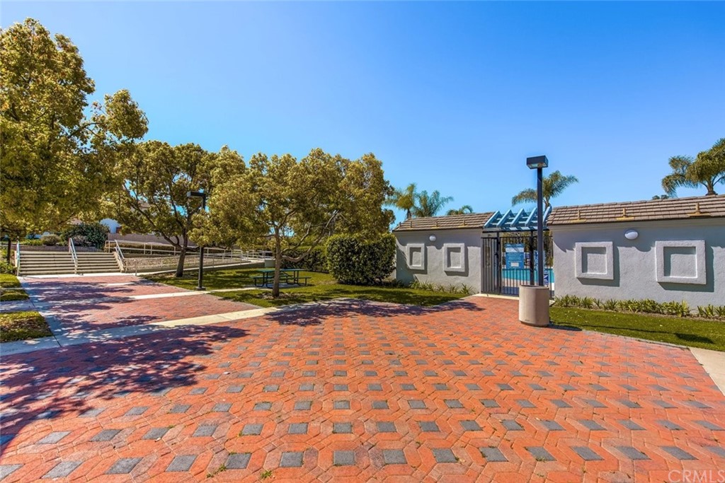 4091 Germainder Way Irvine, CA 92612 - Photo 47 of 47 a front view of a house with a yard