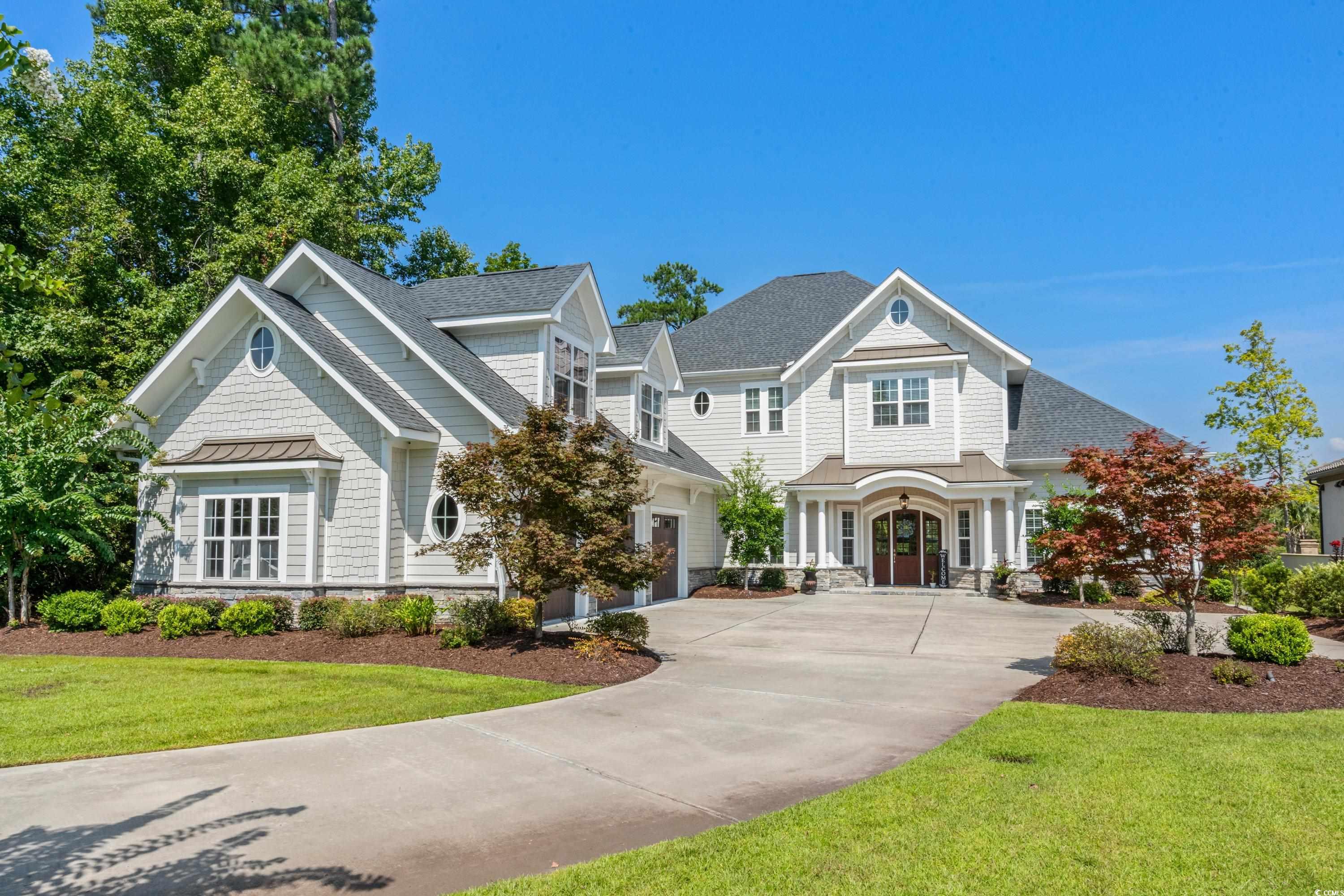 348 Chamberlin Road Myrtle Beach, SC 29588 - Photo 1 of 40 Craftsman-style home featuring a front yard