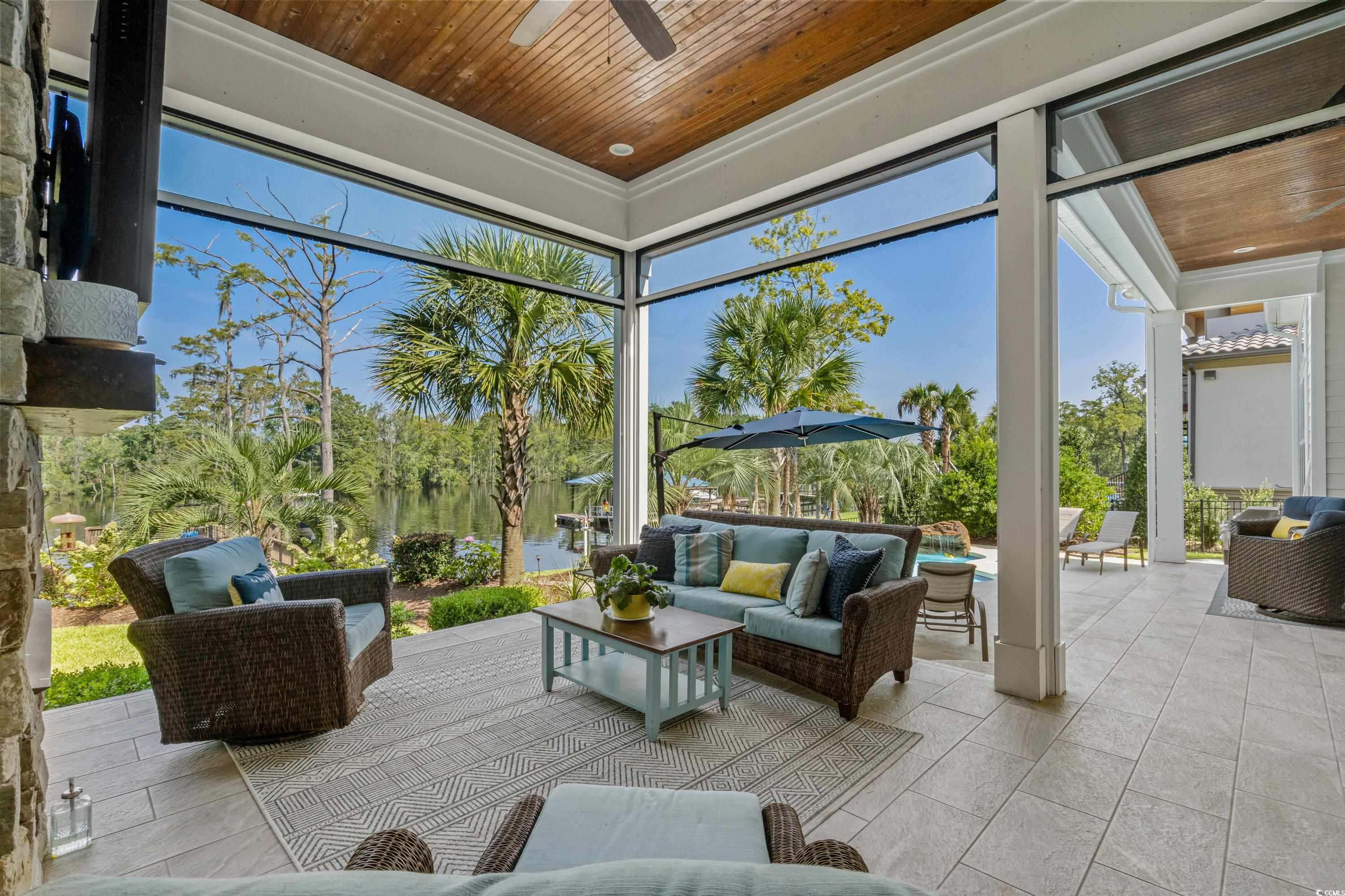 348 Chamberlin Road Myrtle Beach, SC 29588 - Photo 23 of 40 View of patio with an outdoor living space and cei