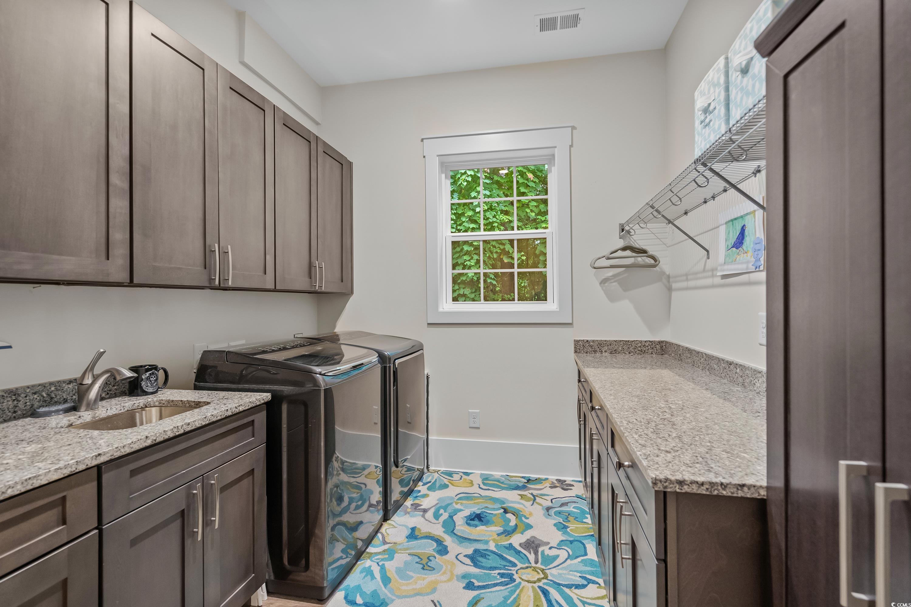 348 Chamberlin Road Myrtle Beach, SC 29588 - Photo 39 of 40 Laundry area featuring light tile patterned floori