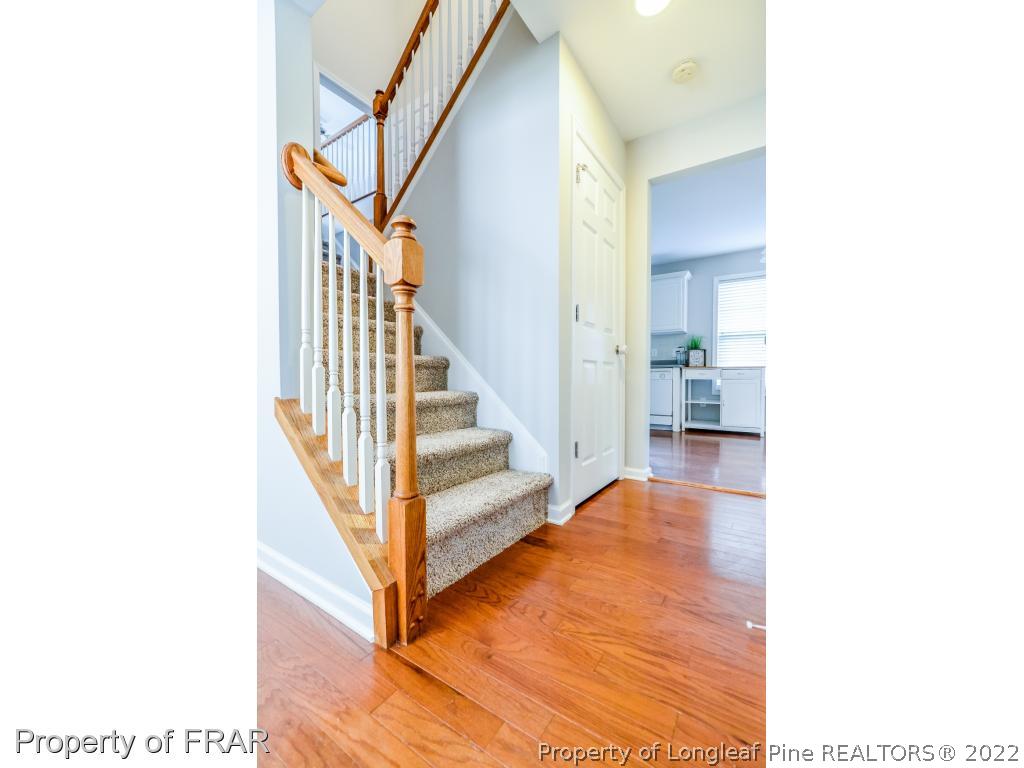 67 Pender Road Spring Lake, NC 28390 - Photo 17 of 34 a view of a hallway with staircase