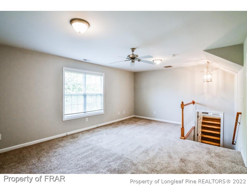 67 Pender Road Spring Lake, NC 28390 - Photo 20 of 34 a view of an empty room with a window