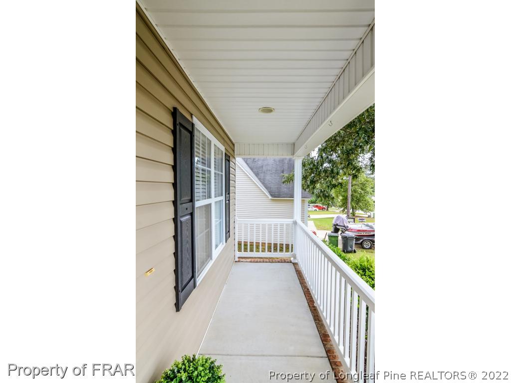67 Pender Road Spring Lake, NC 28390 - Photo 2 of 34 a view of a porch