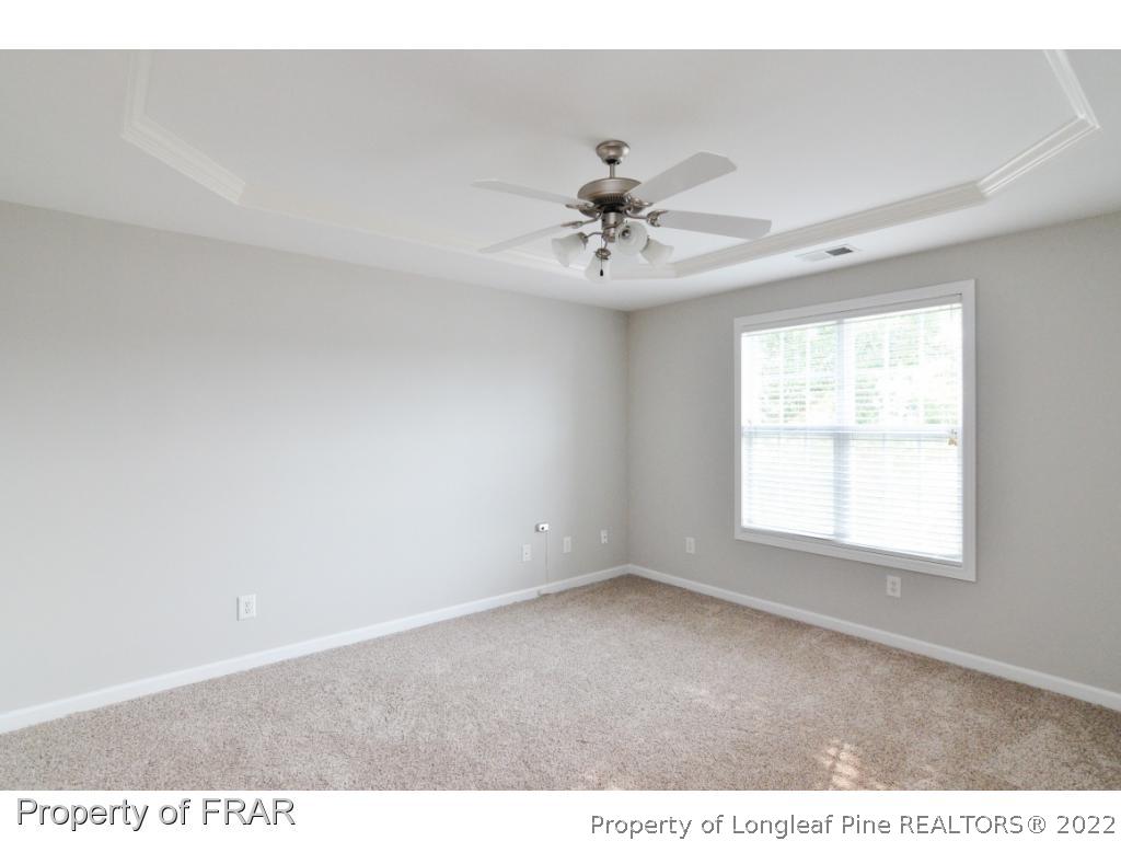 67 Pender Road Spring Lake, NC 28390 - Photo 25 of 34 a view of an empty room with a window