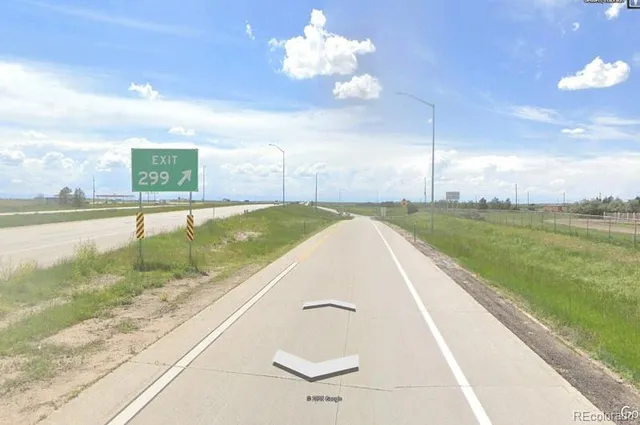 a view of a swimming pool and an outdoor space