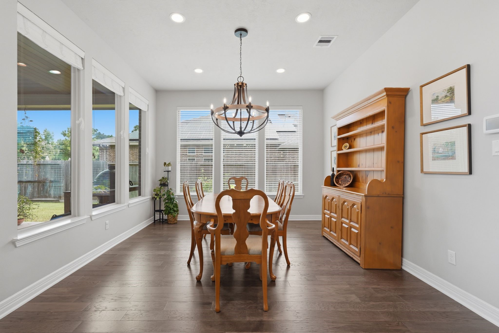 27705 South Slate Hills Lane Spring, TX 77386 - Photo 14 of 45 Large dining space with views of the stunning outdoor patio and pool.