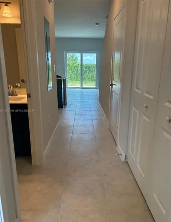 a view of hallway with walk in closet