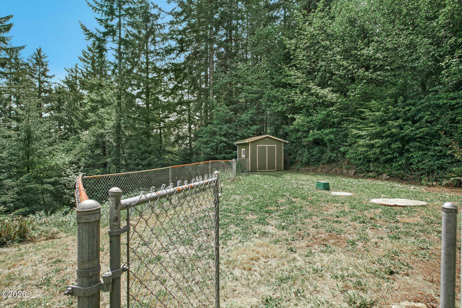 3909 North Bayview Road Waldport, OR 97394 - Photo 33 of 44 Fenced Backyard