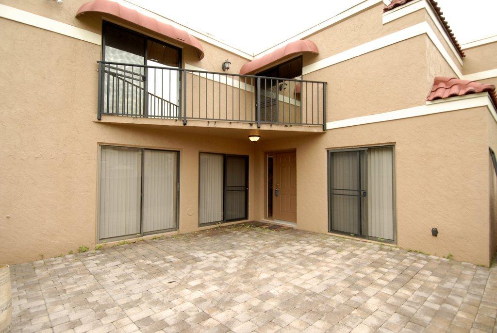 8122 Severn Drive, Unit A Boca Raton, FL 33433 - Photo 2 of 30 a view of an entrance of the house