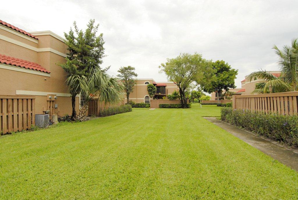 8122 Severn Drive, Unit A Boca Raton, FL 33433 - Photo 22 of 30 a view of a street with houses on both side of it