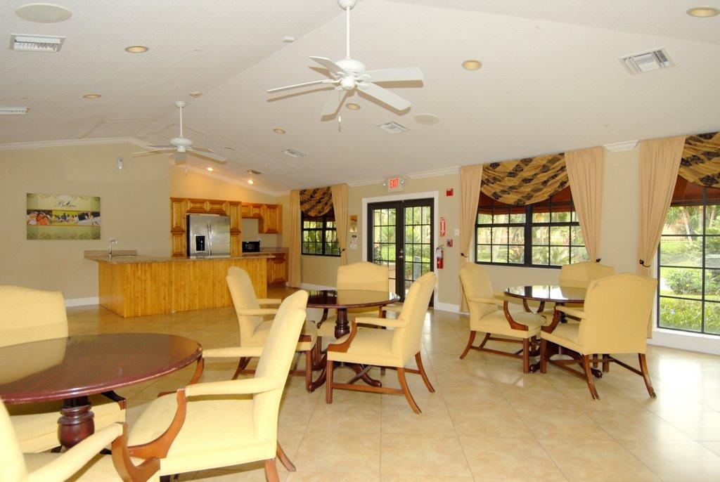 8122 Severn Drive, Unit A Boca Raton, FL 33433 - Photo 24 of 30 a view of a dining room with furniture