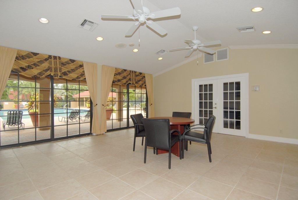 8122 Severn Drive, Unit A Boca Raton, FL 33433 - Photo 25 of 30 a view of a dining room with furniture window and outside view