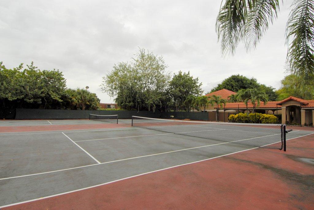 8122 Severn Drive, Unit A Boca Raton, FL 33433 - Photo 30 of 30 a view of a tennis court