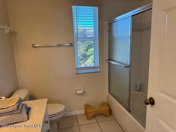 wooden floor with view of workspace