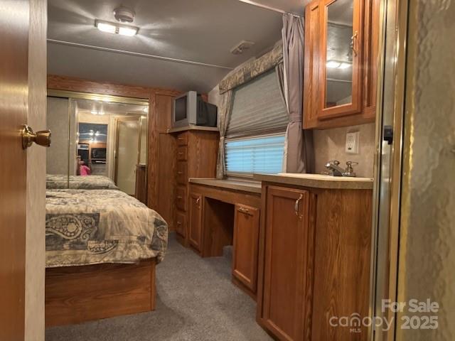 203 River Ridge Trail Mount Gilead, NC 27306 - Photo 6 of 9 a bedroom with a bed and a mirror