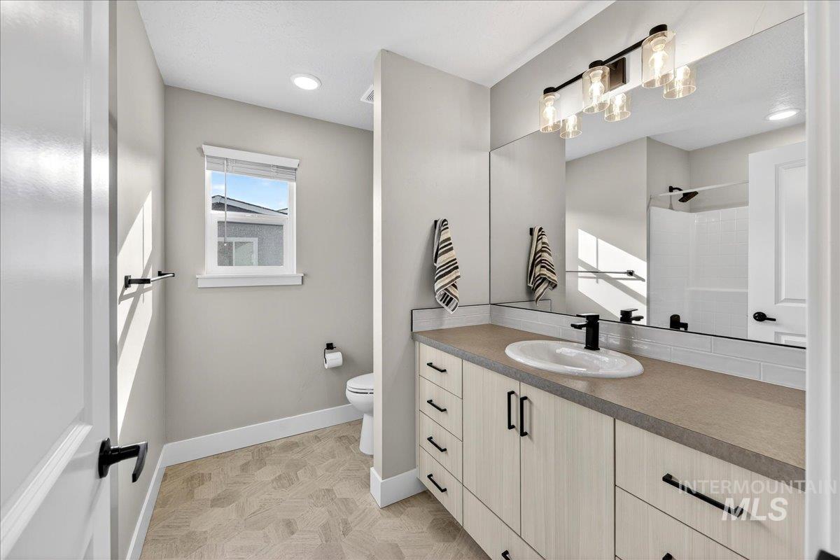 6025 South Catria Place Meridian, ID 83642 - Photo 21 of 34 Full bath with vanity and a shower