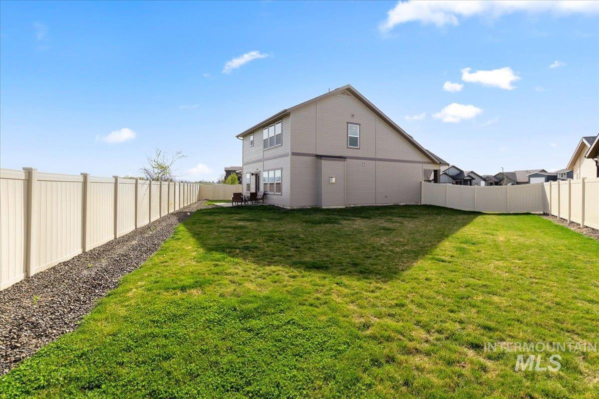 6025 South Catria Place Meridian, ID 83642 - Photo 31 of 34 Back of house with a fenced backyard