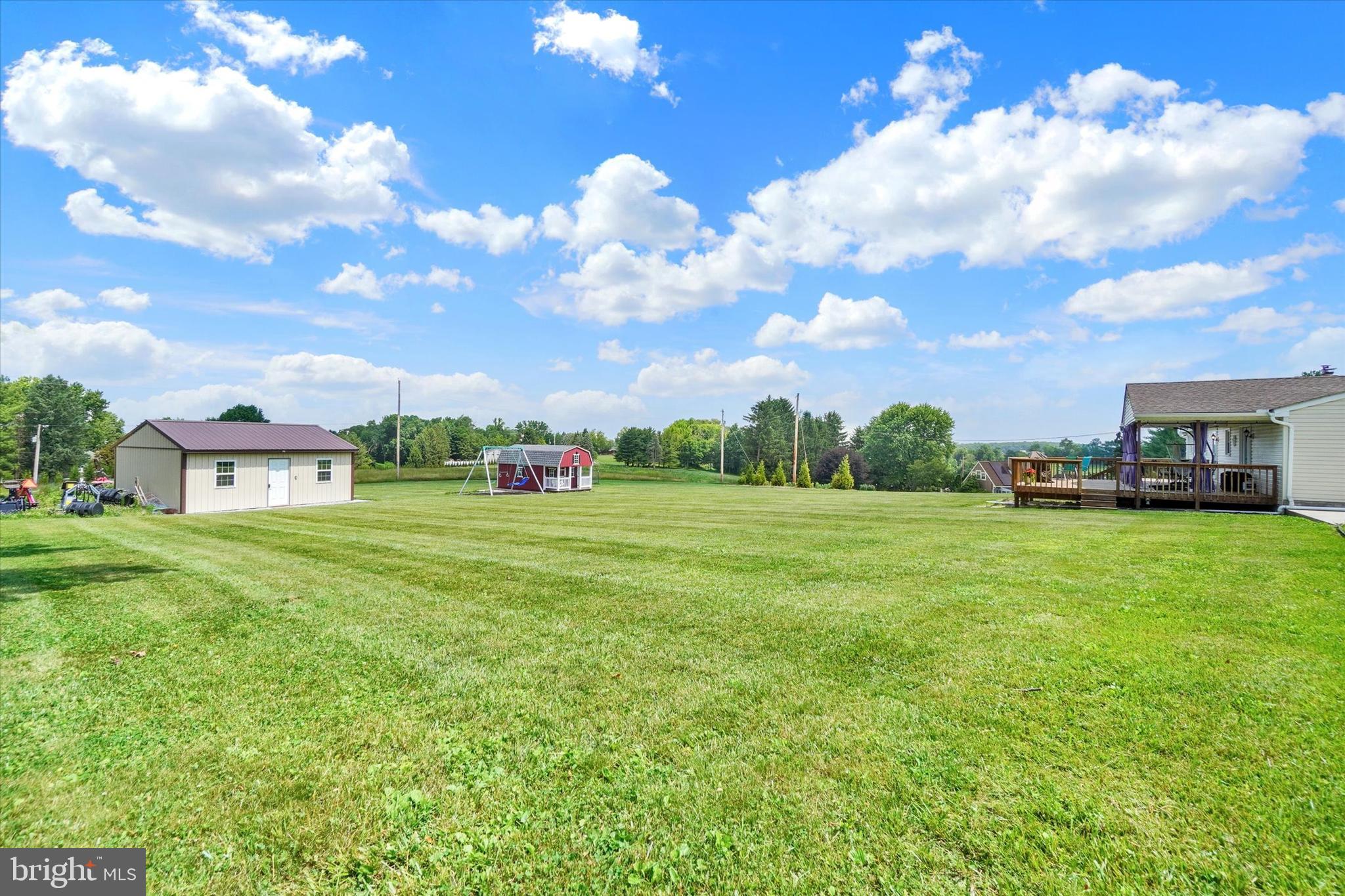 13174 Mont Road Felton, PA 17322 - Photo 11 of 39 a view of a garden with a house in the background