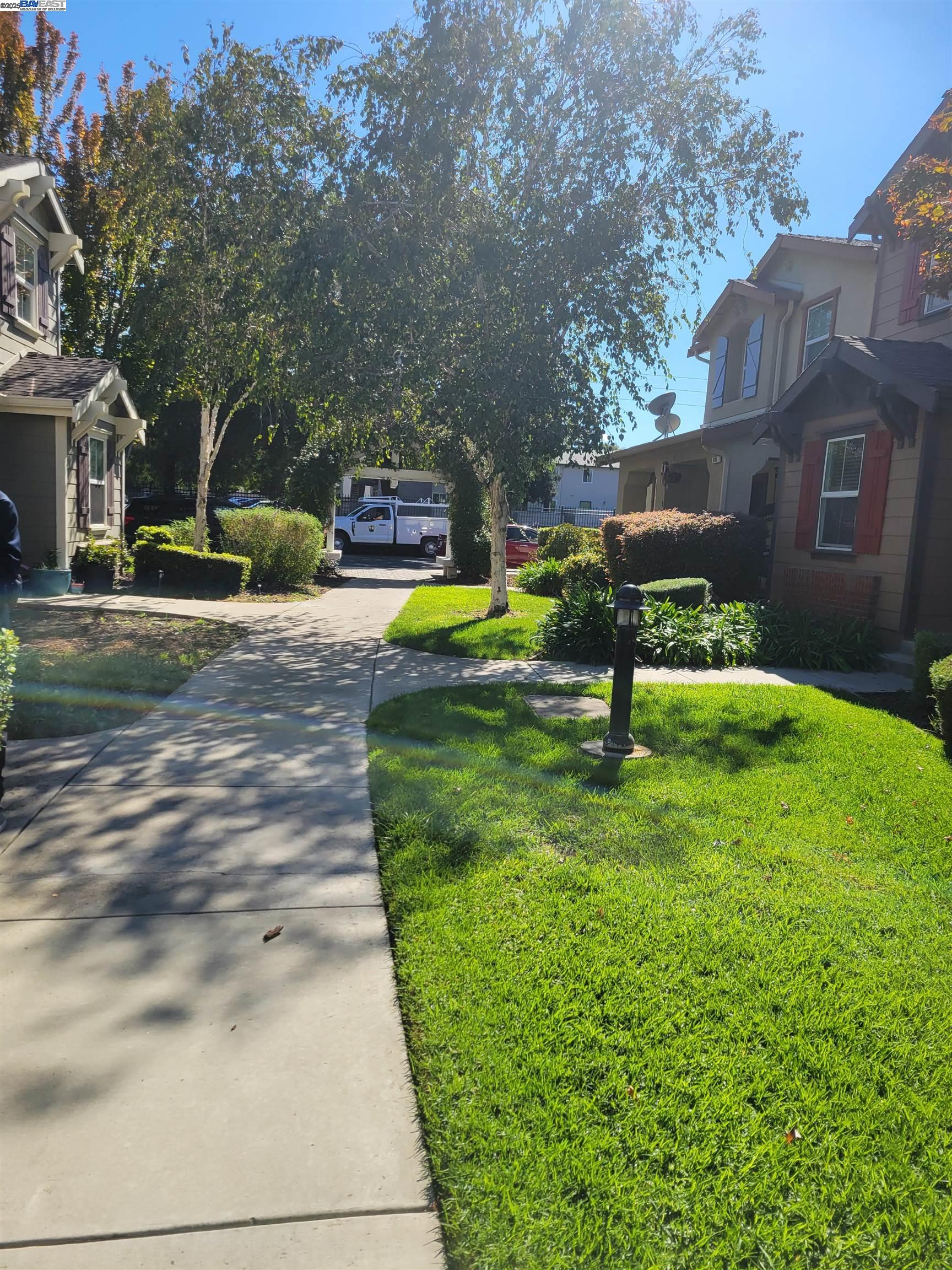 313 Turnstone Circle Pittsburg, CA 94565 - Photo 4 of 16 a view of a park with large trees