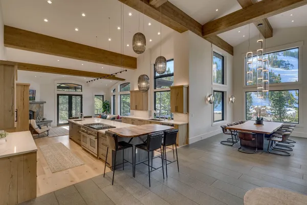 a kitchen with a table and chairs in it