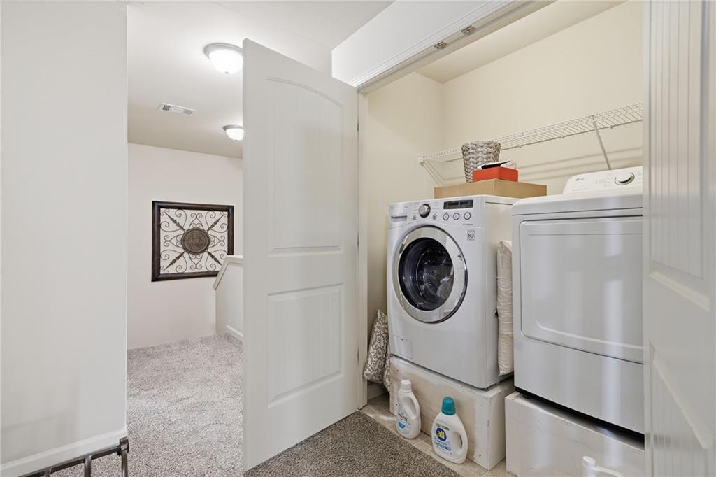 608 Myers Gate Road Ball Ground, GA 30107 - Photo 16 of 31 a utility room with dryer and washer