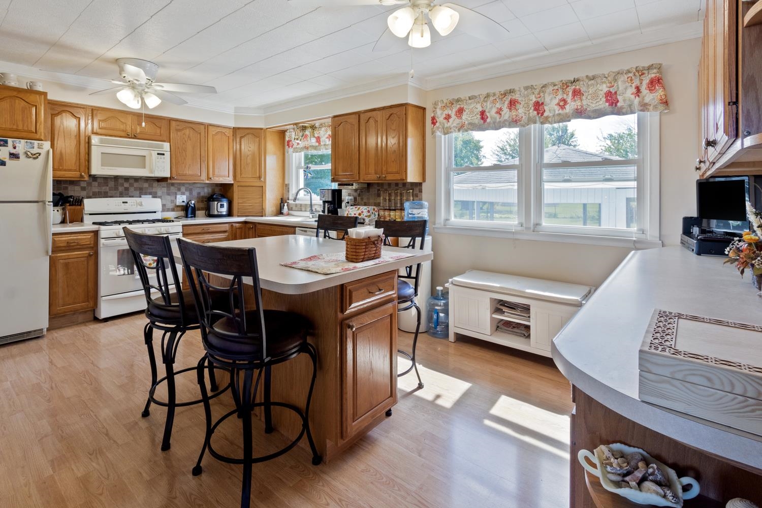 1639 Us Rt 52 Dixon, IL 61021 - Photo 13 of 31 a kitchen with a table chairs stove and cabinets